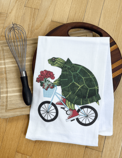 Biking Turtle Jane tea towel